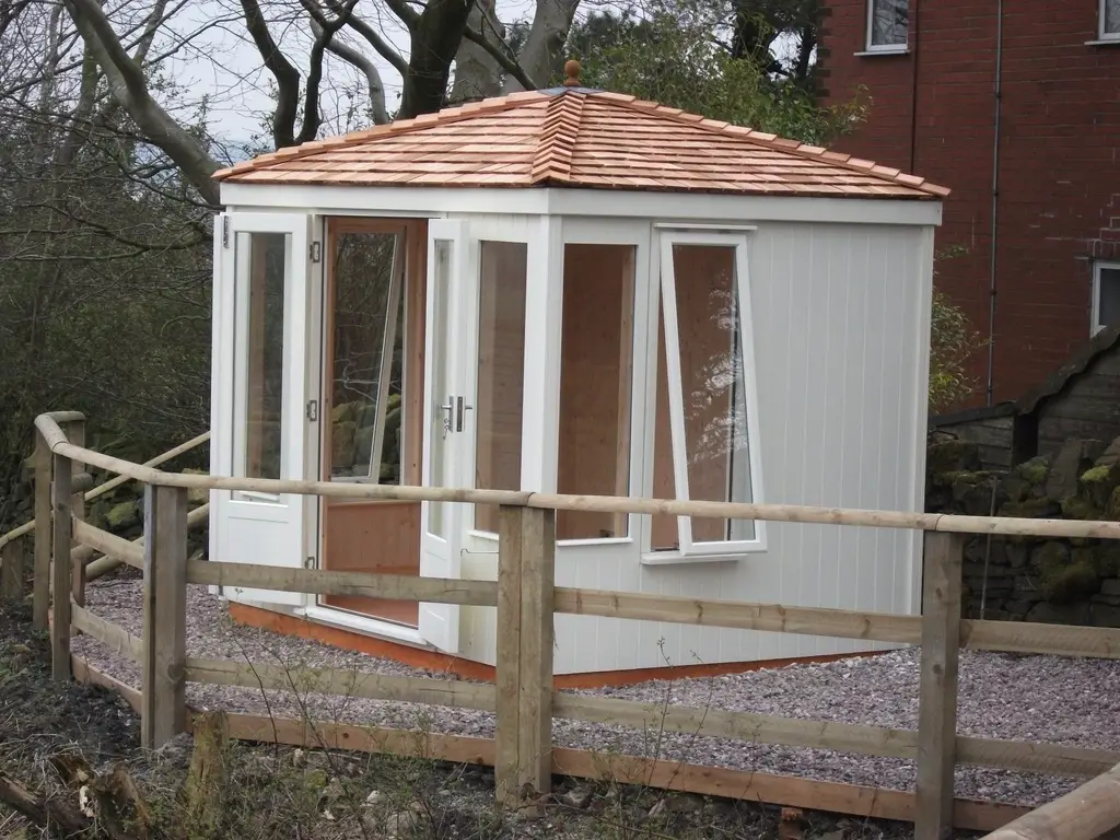OUR ANTIGUA SUMMERHOUSE WITH CEDAR SHINGLE ROOF AND OPENING WINDOWS