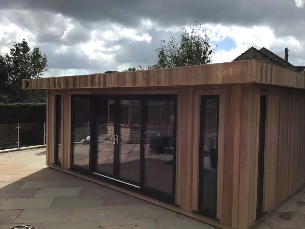 CEDAR CLAD HOME OFFICE AND STUDIO WITH UPCV DOORS AND WINDOWS