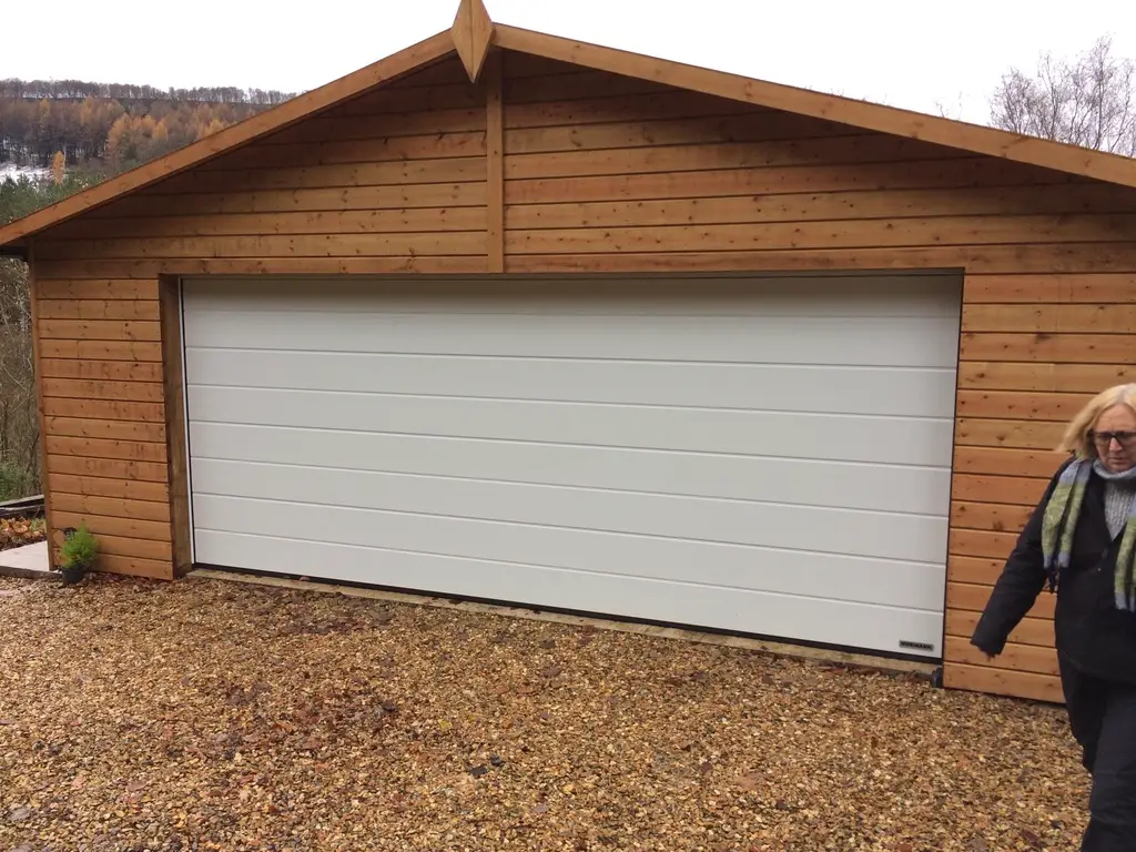 HEAVY DUTY DOUBLE TIMBER GARAGE WITH UP AND OVER STEEL DOOR