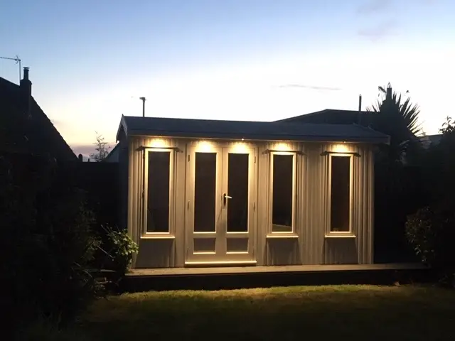 CUSTOM BUILT STUDIO WITH STORE - PAINTED , FULLY LINED AND INSULATED WITH ELECTRICS BY LANCASHIRE SUMMERHOUSES