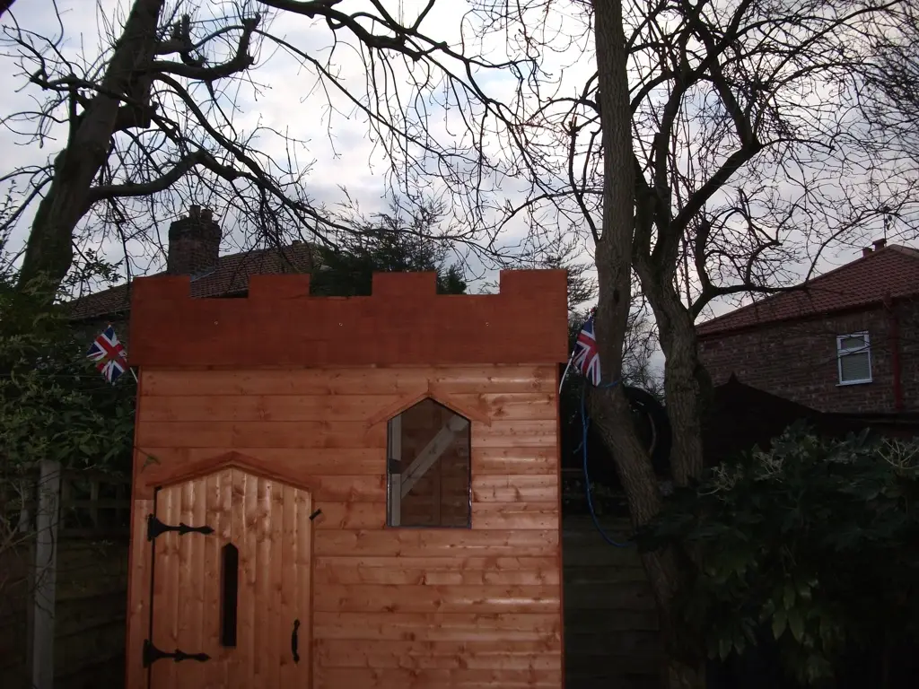 OUR KINGS CASTLE PLAY SHED IS A MINI KINGS CASTLE MADE FROM TIMBER