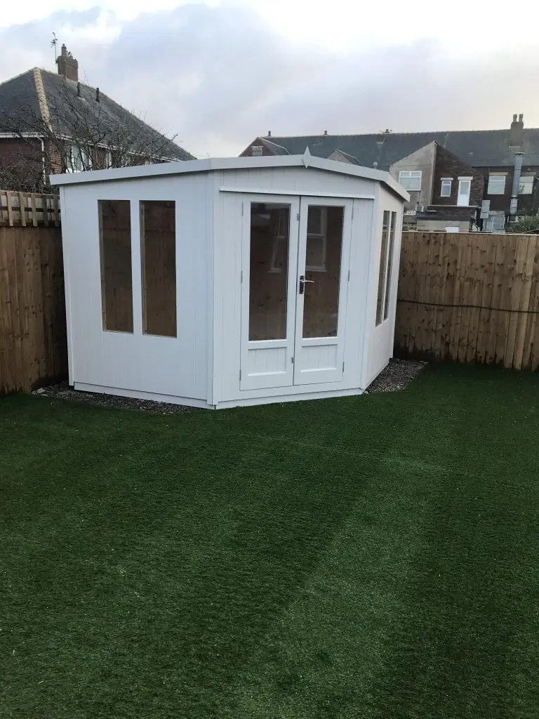 PAINTED CORNER SUMMERHOUSE MADE WITH AN APEX ROOF