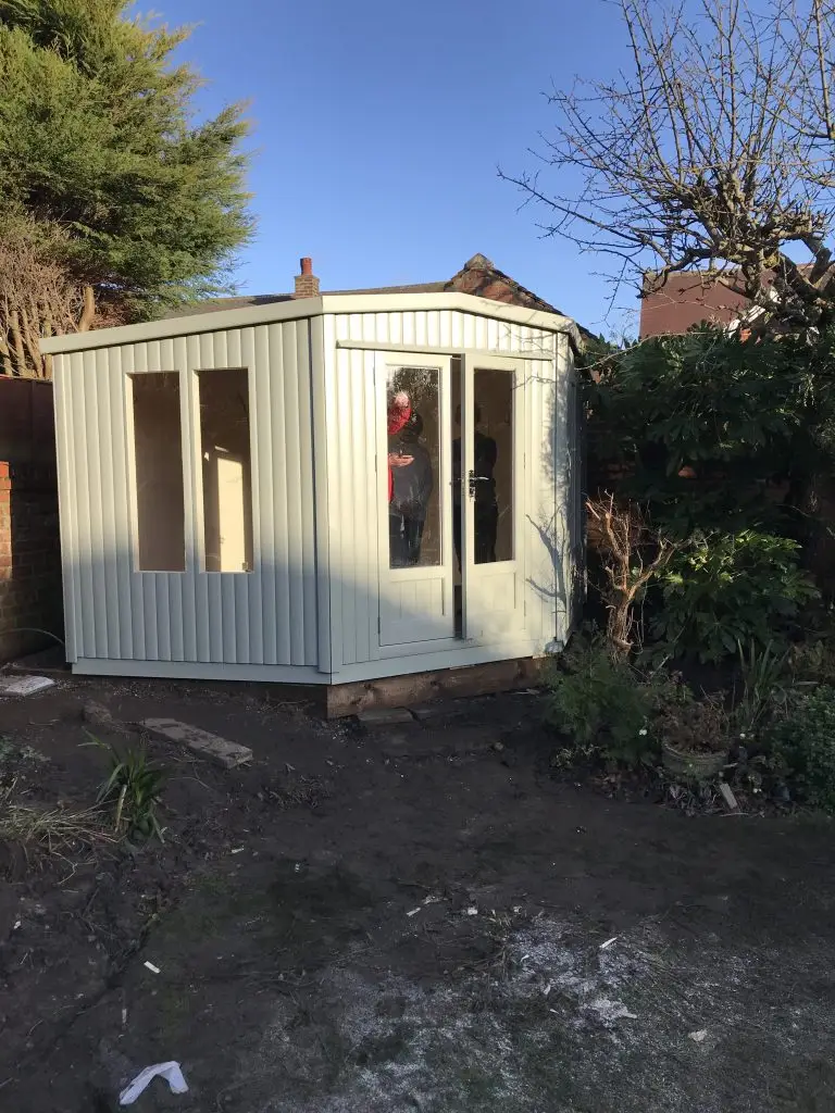 our apex roof corner summerhouse fully lined and insulated for year long use