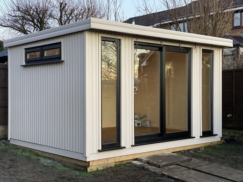 FULLY LINED AND INSULATED SUMMERHOUSE WITH UPVC DOORS AND WINDOWS