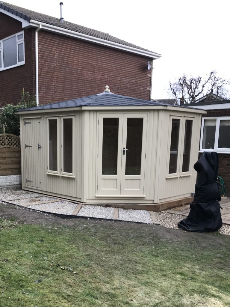 CORNER SUMMERHOUSE AND STORE WITH A VAULTED ROOF
