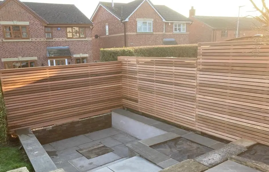 photo shows custom made cedar fencing for a customers garden