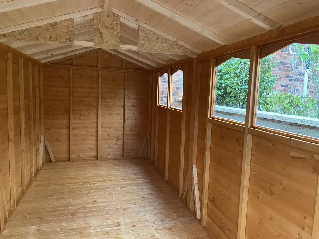 THIS PHOTO SHOWS A TIMBER WORKSHOP INTERIOR
