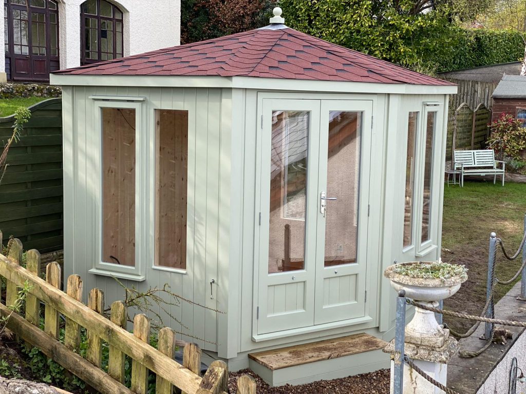 Painted Corner Summerhouse with a red roof